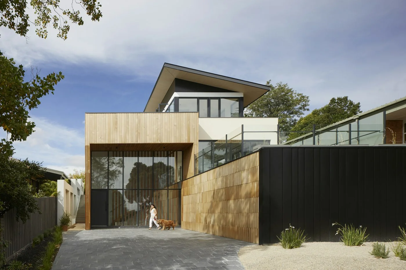 Contemporary residential home with a private driveway, illustrating a Pinebrook-style house move