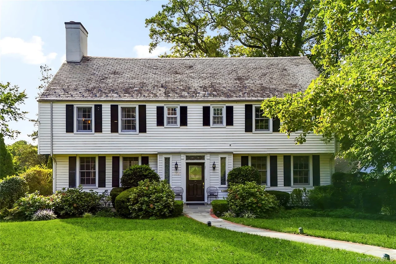 Two-story house with landscaped front yard