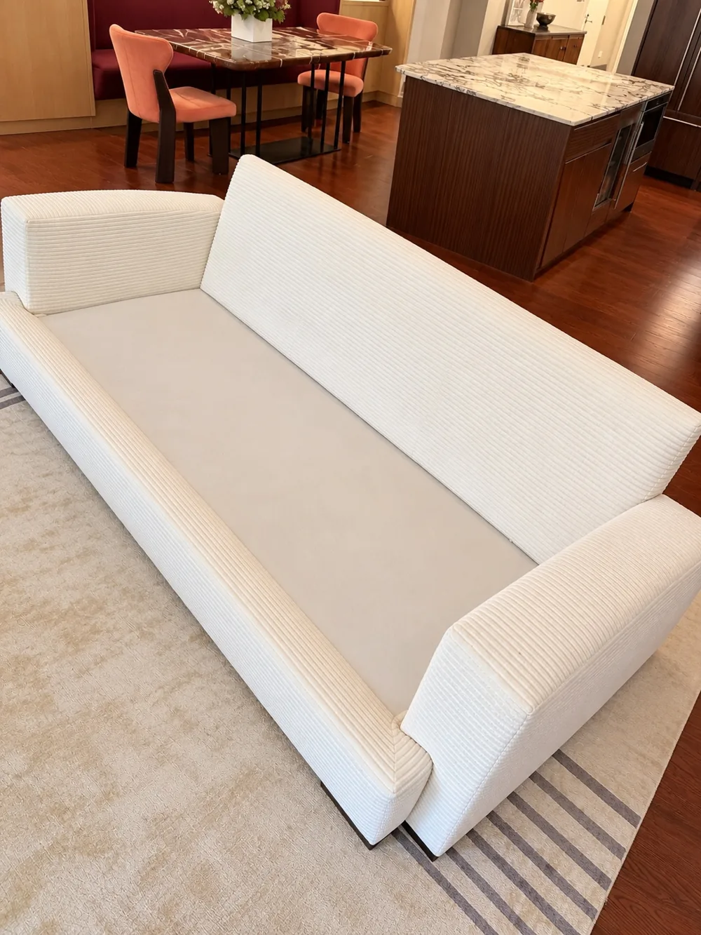 White upholstered sofa inside a client’s home